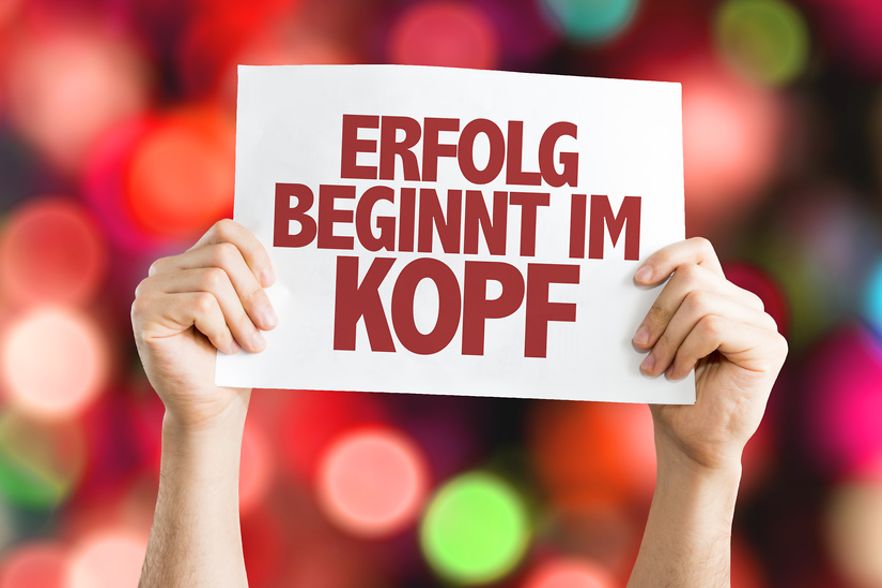 Schild: Erfolg beginnt im Kopf