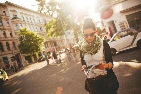 Female tourist walking on the street in Berlin