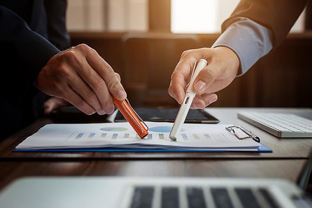 Business people meeting at working with financial reports
