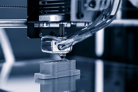 Electronic three dimensional plastic printer during work , 3D , printing.