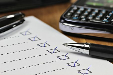 Checkliste mit Kugelschreiber