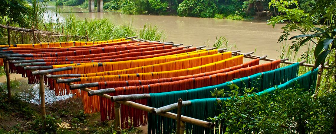 The colorful yarn has been dyed and dried into the sun.