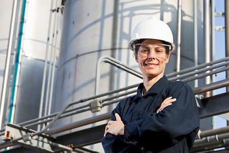 Female worker at an industrial plant