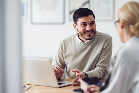 Home Office: Man and Woman Having a Meeting