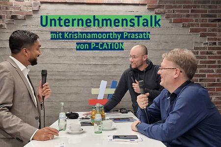 Tobias Prinz und Michael Dolny sprechen mit Krishnamoorthy Prasath von P-CATION