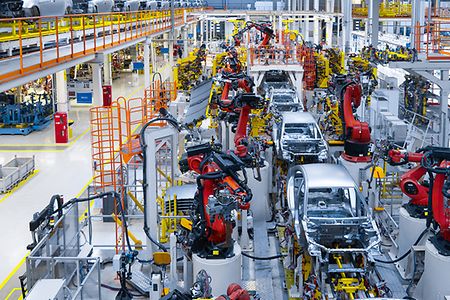 Automotive production line. Welding car body. Modern car Assembly plant