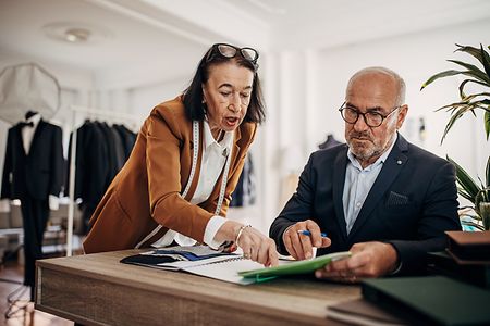 Designers in clothing workshop