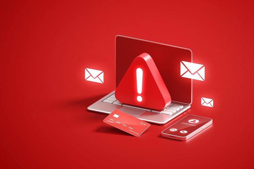 Ein Laptop zeigt ein E-Mail-Symbol und einen roten Umschlag, symbolisiert den Austausch von Nachrichten.