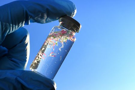 Collecting water samples contaminated with microplastics, plastic pollution