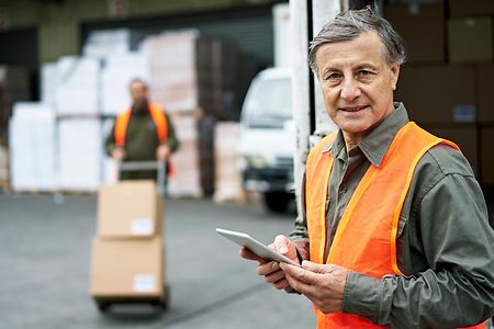 Candid Portrait of Senior Male Loading Dock Worker