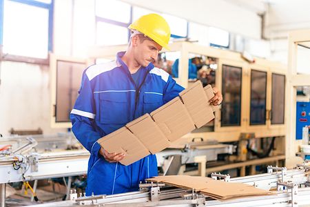 Production of recycled paper material and packaging